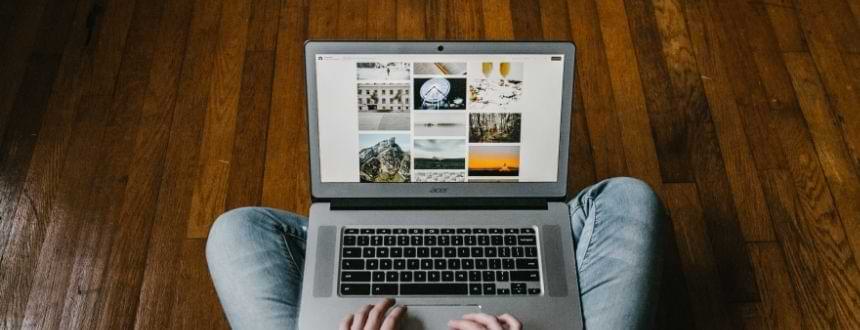 Best Internet Plans in Canada : a laptop on on the legs of a person using it