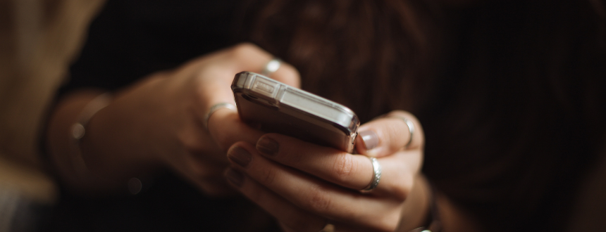 Woman looking at her visual voicemail