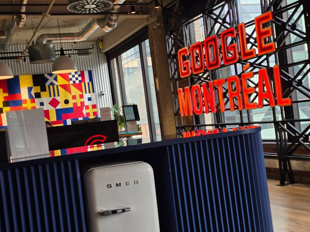 Interior of Google’s Montreal office with the red Google Montreal sign