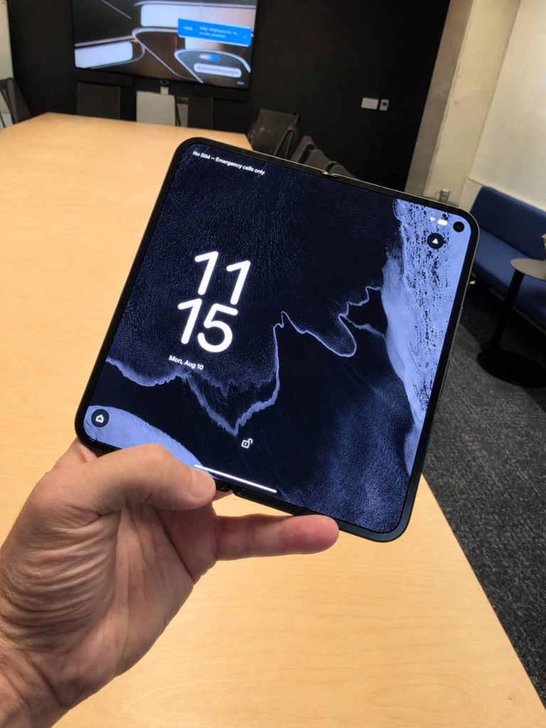 Google Pixel 11 Pro Fold held in one hand with its 8-inch inner display unfolded. Photo: Julien Junet / PlanHub