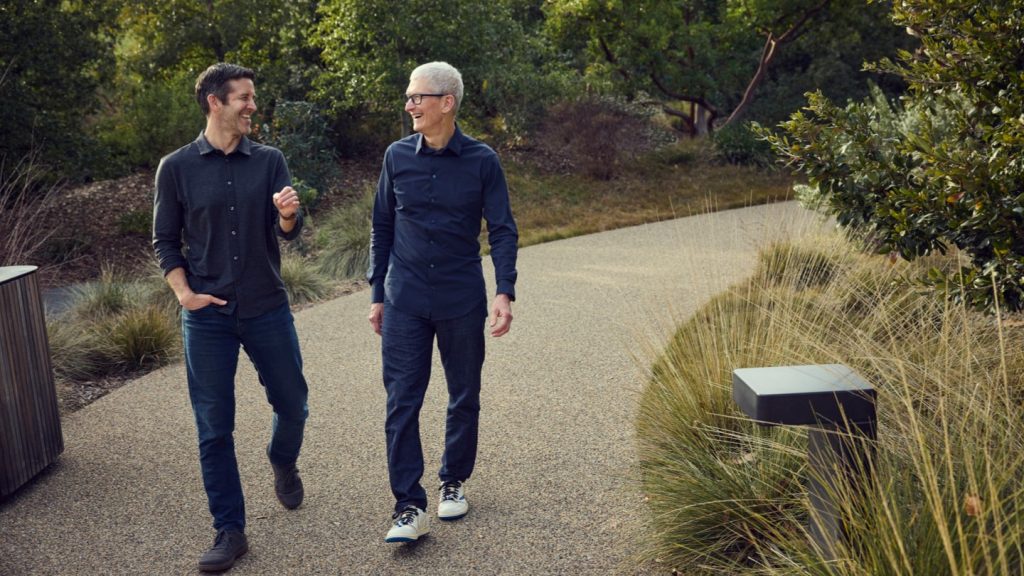 John Ternus and Tim Cook walking together at Apple Park in 2026
